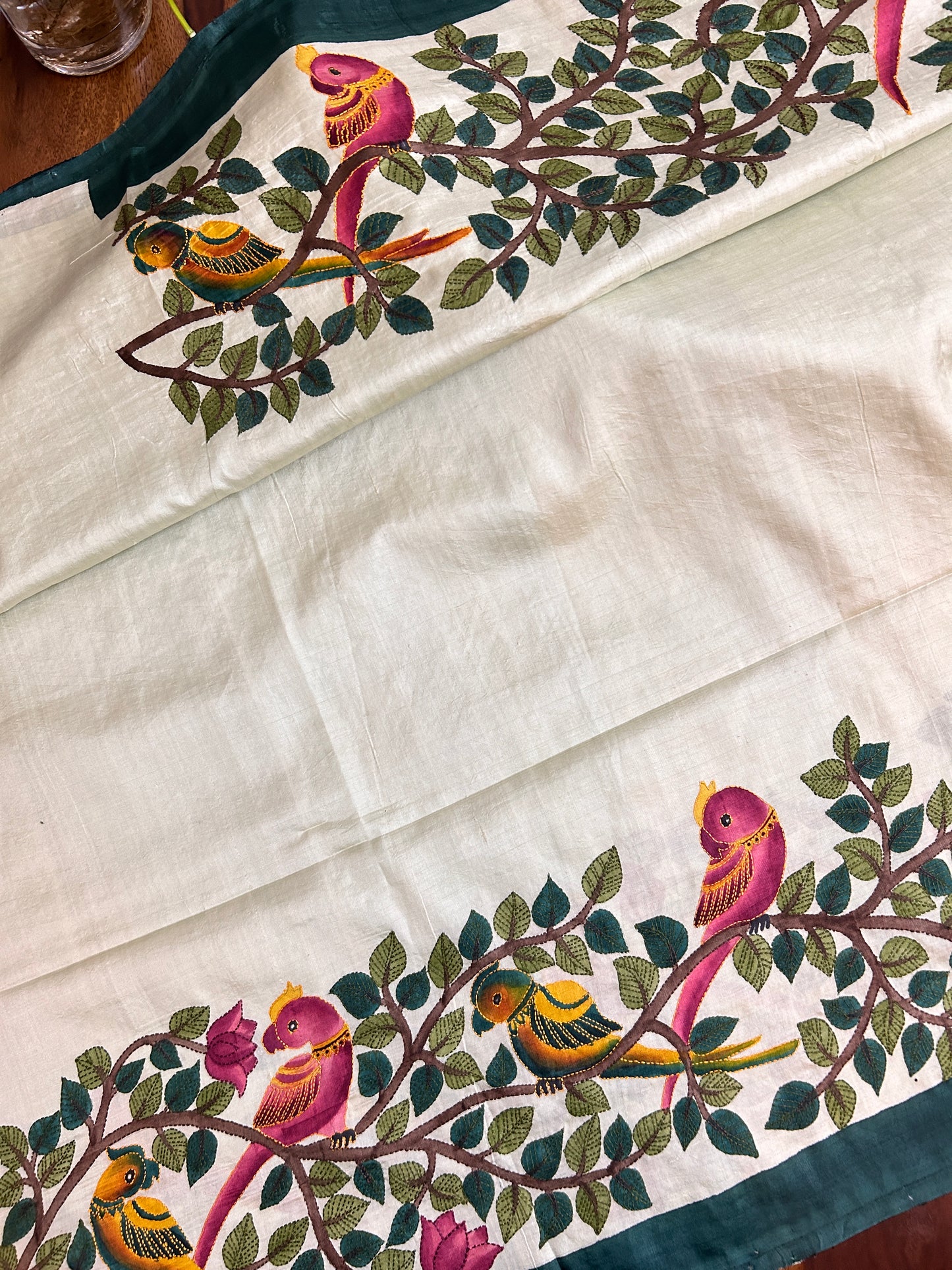 Handcrafted Saree: A Fusion of Painting and Embroidery