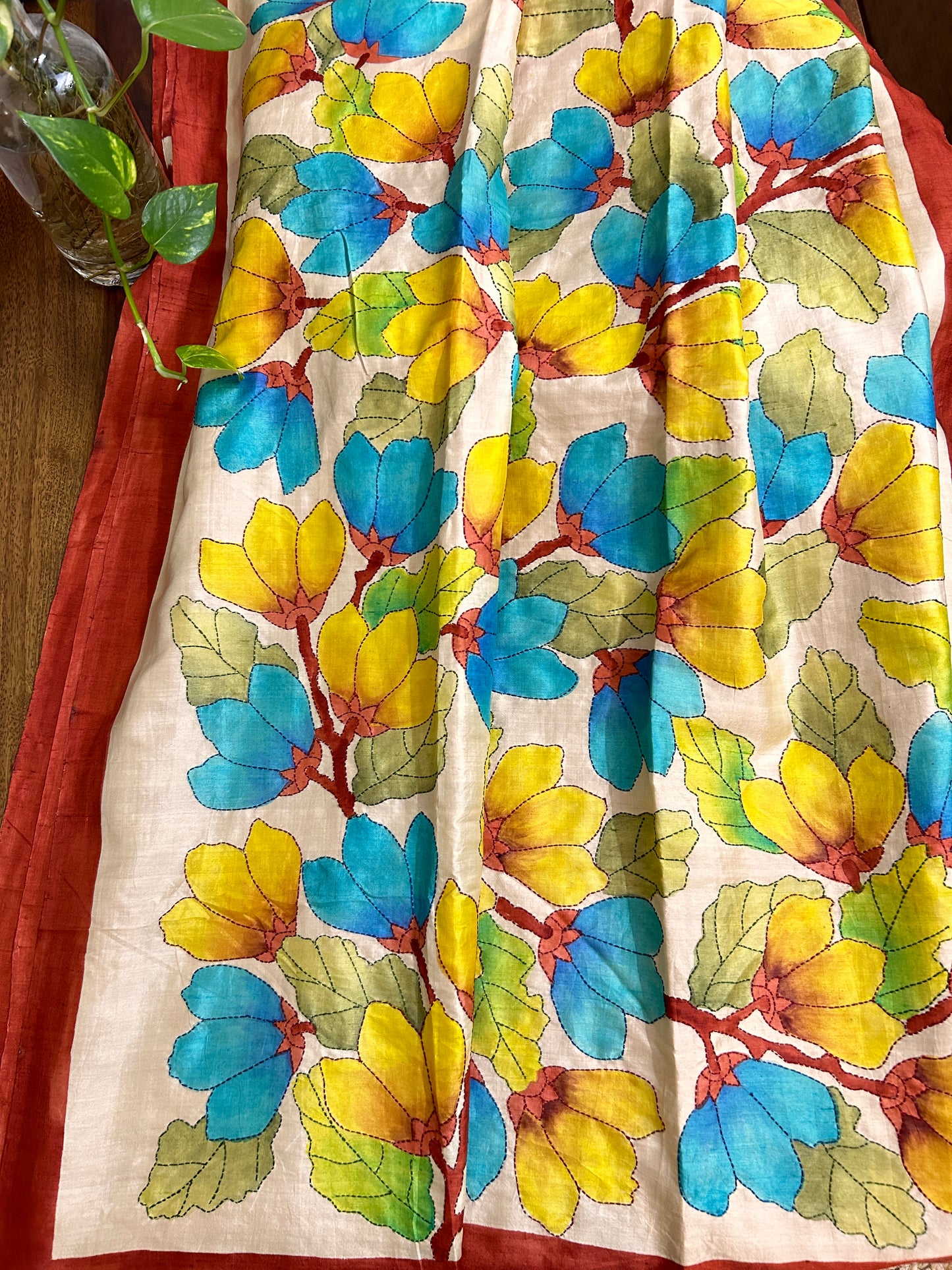 Handcrafted Saree: A Fusion of Painting and Embroidery