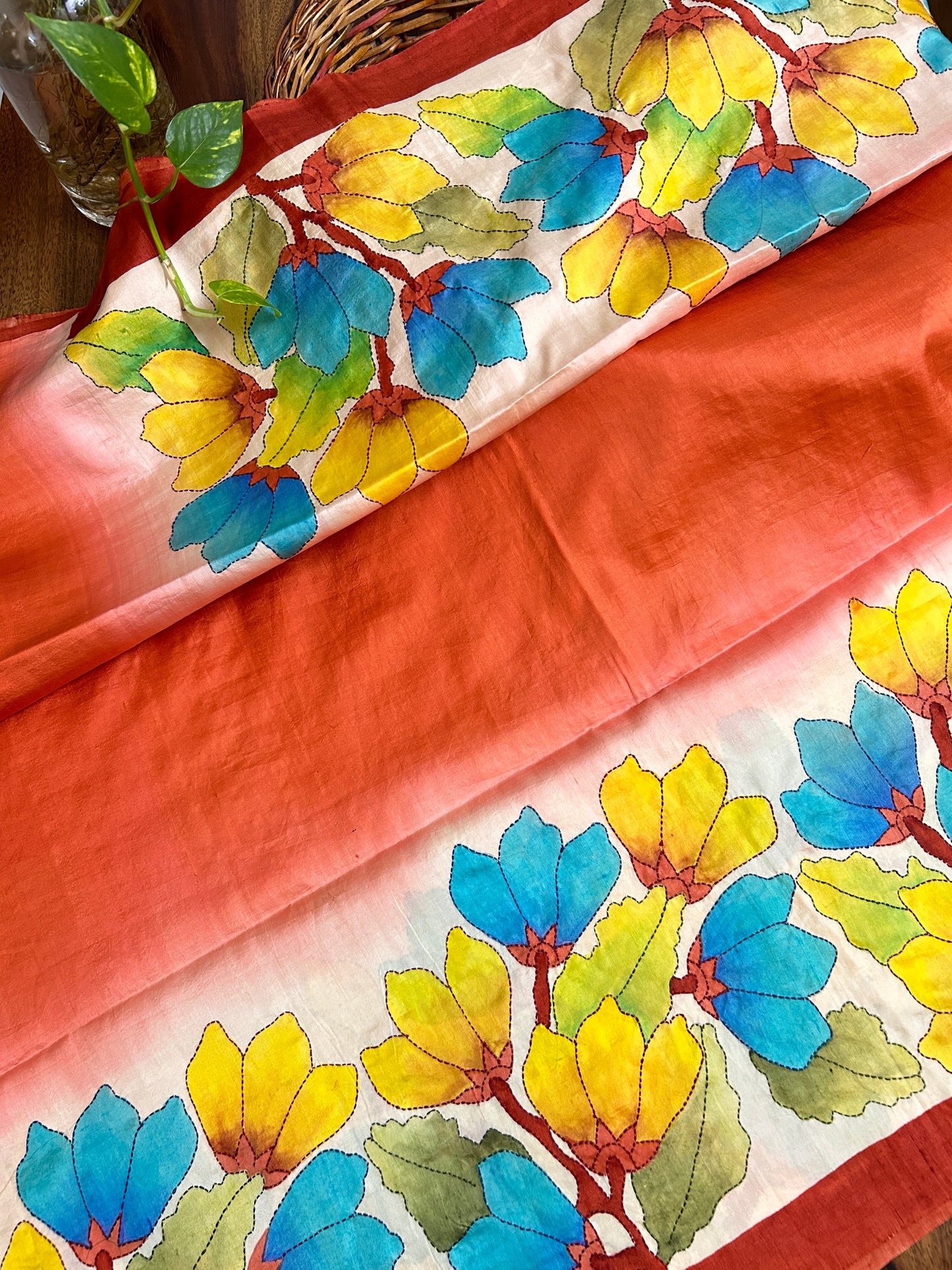 Handcrafted Saree: A Fusion of Painting and Embroidery