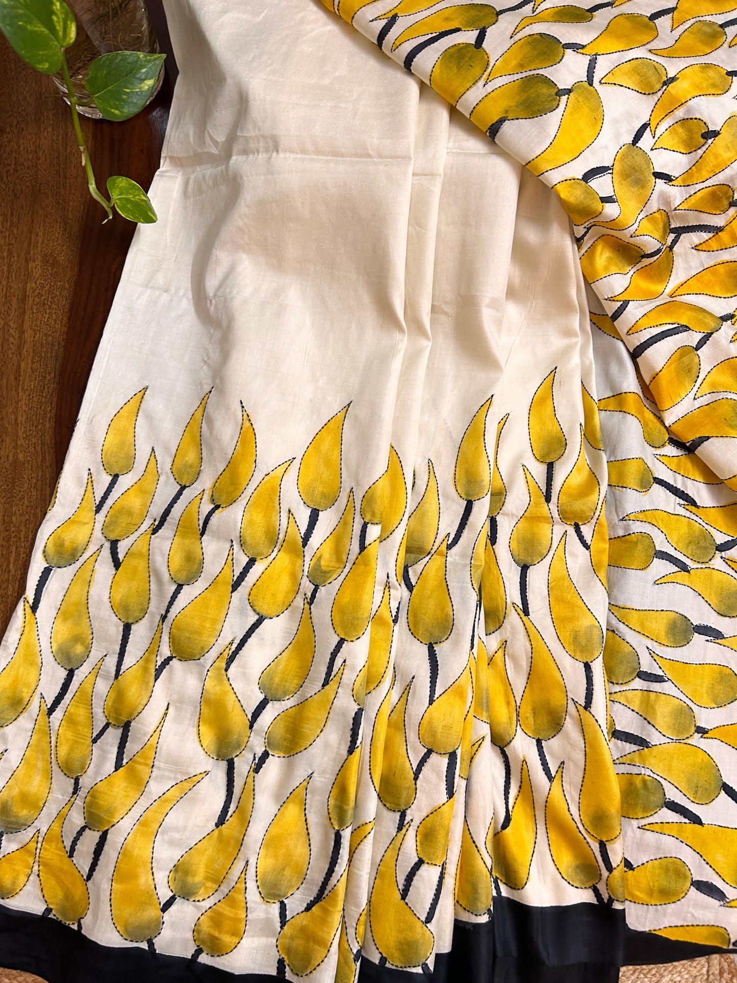 Handcrafted Saree: A Fusion of Painting and Embroidery